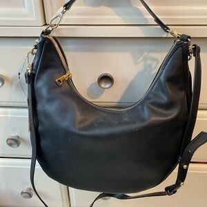 INC International Concepts Black and Gold Hobo with Sleek Design